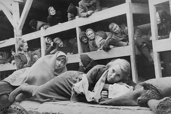 A historical picture of women in barracks during the liberation of Auschwitz concentration camp